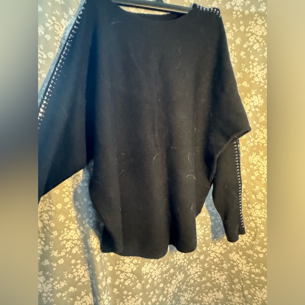 Black sweater size small rhinestone details on arm